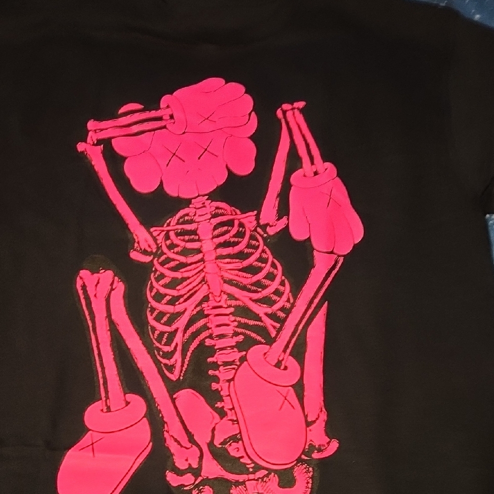 KAWS Black Tee with Pink Skeleton Design
